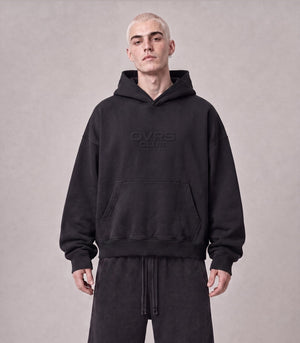 Essential Oversized Hoodie in Black, front view on model