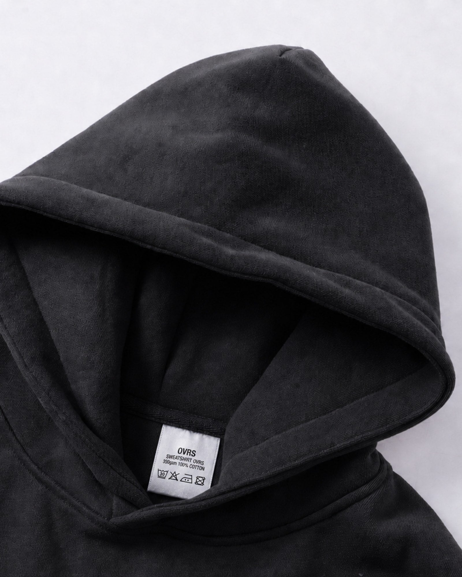 Essential Oversized Hoodie in Black, fabric and construction detail