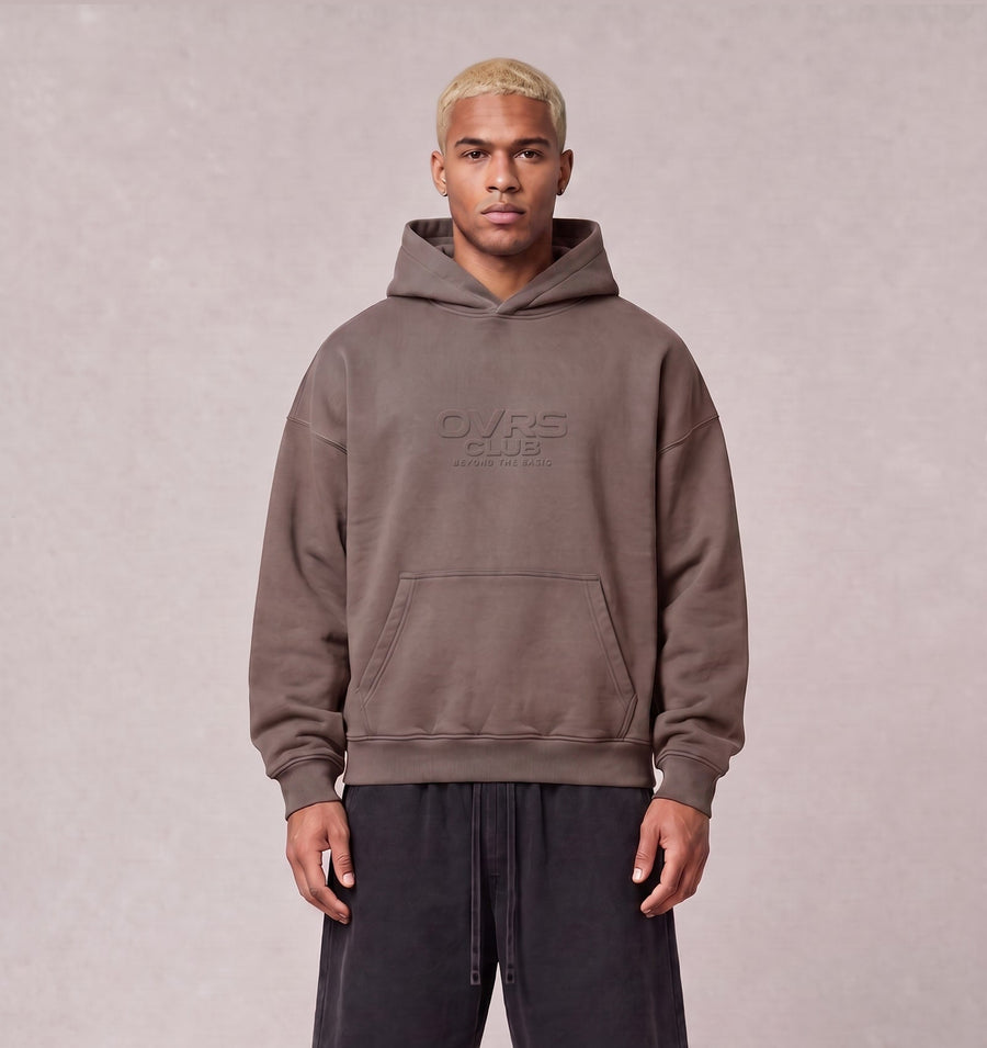 Essential Oversized Hoodie in Brown, front view on model