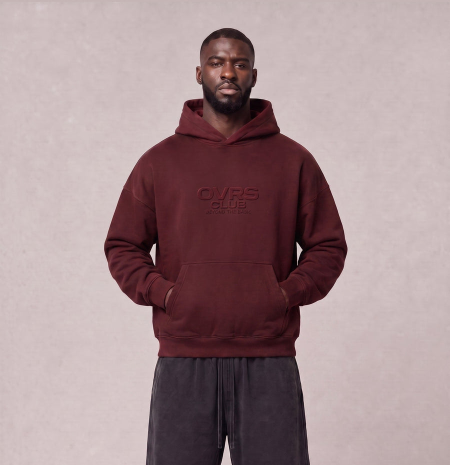 Essential Oversized Hoodie in Dark Red, front view on model
