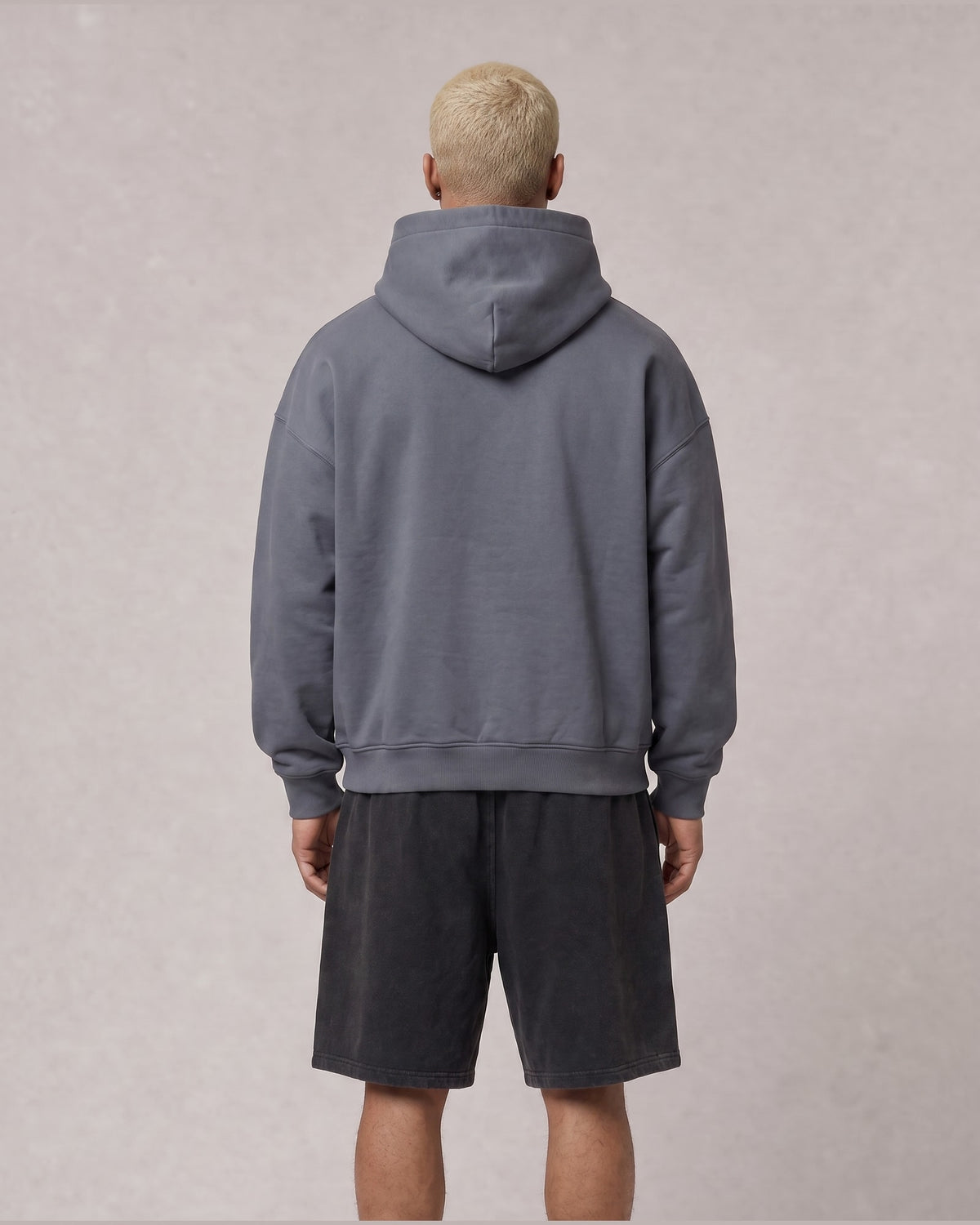 Essential Oversized Hoodie in Gray Blue, back view on model
