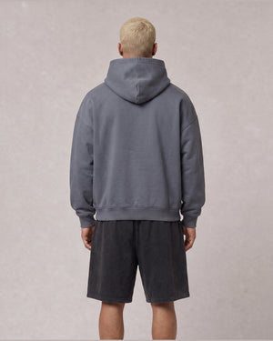 Essential Oversized Hoodie in Gray Blue, back view on model