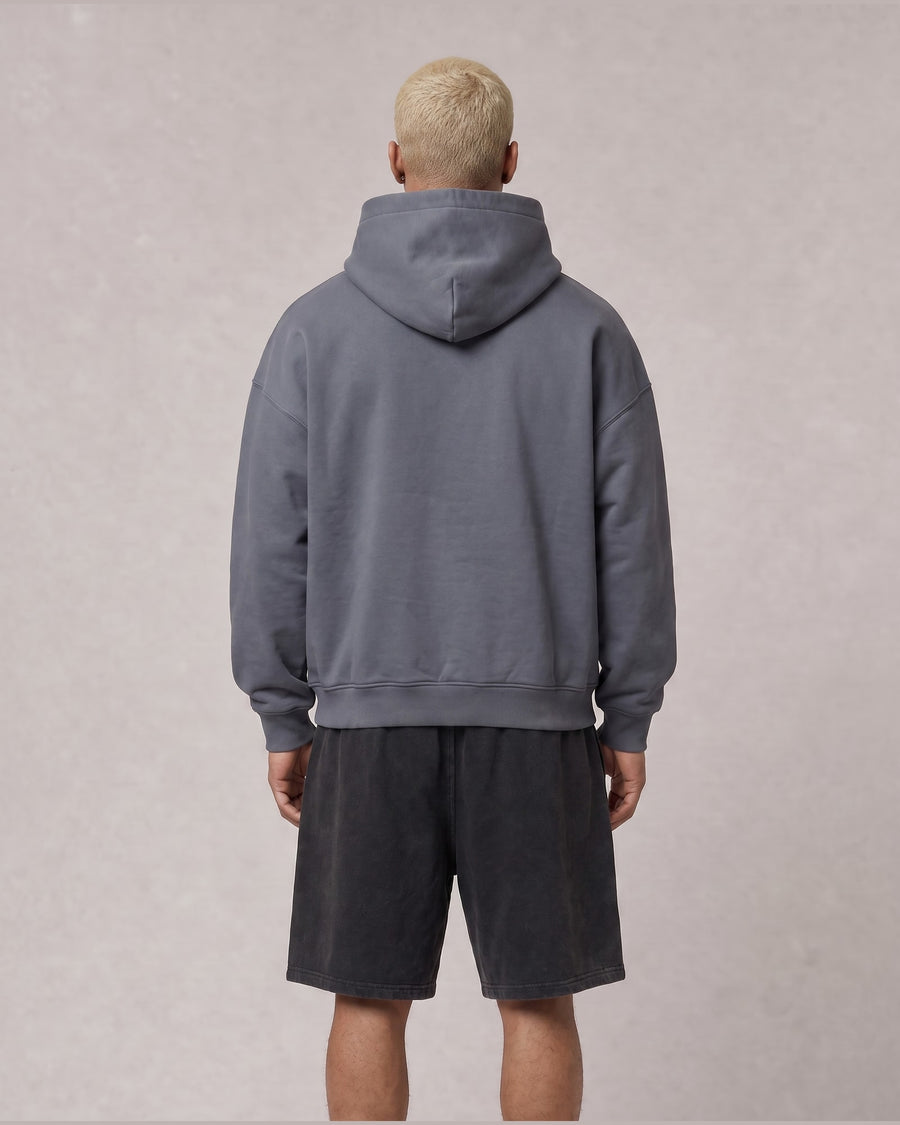 Essential Oversized Hoodie in Gray Blue, back view on model