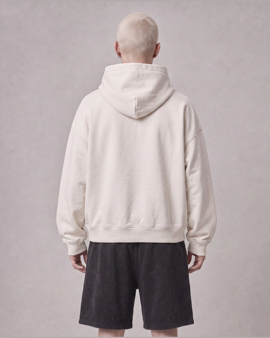 Essential Oversized Hoodie in Off-White, back view on model