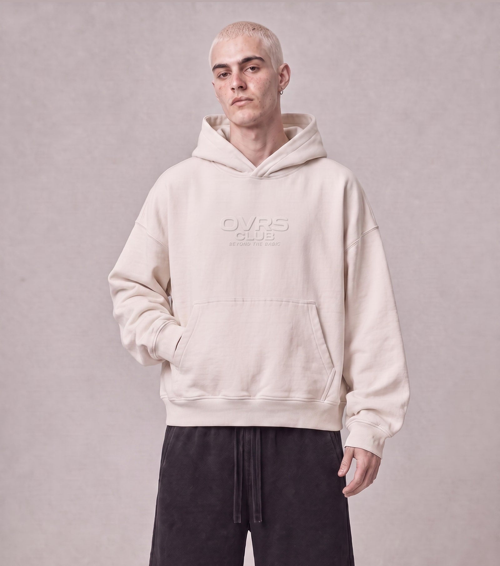 Essential Oversized Hoodie in Off-White, front view on model