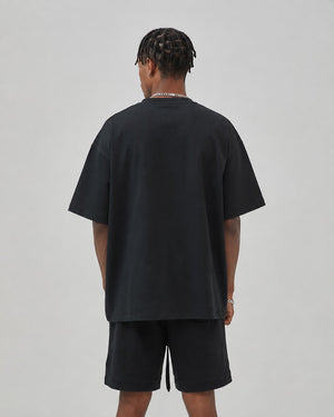 Essential Oversized T-Shirt in Black, back view on model