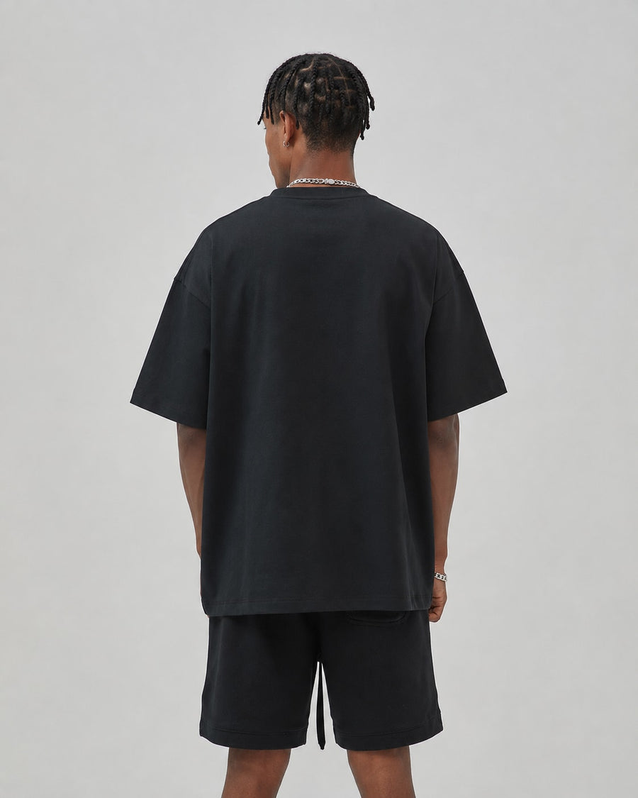 Essential Oversized T-Shirt in Black, back view on model