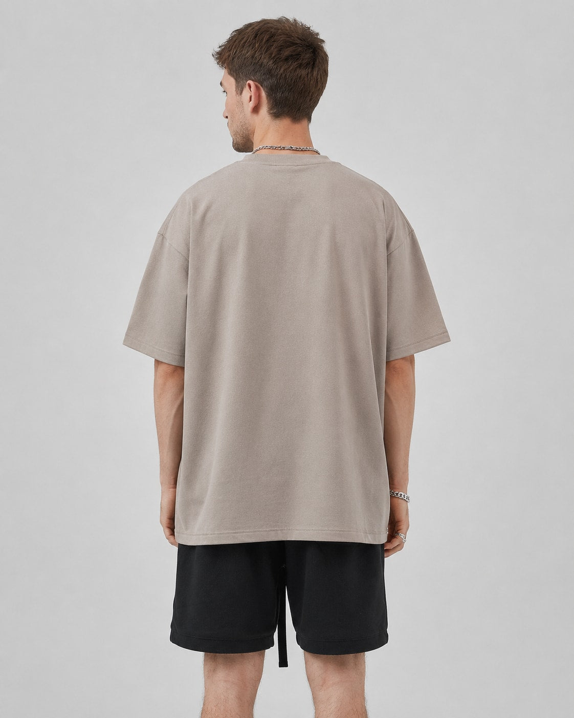 Essential Oversized T-Shirt in Brown, back view on model
