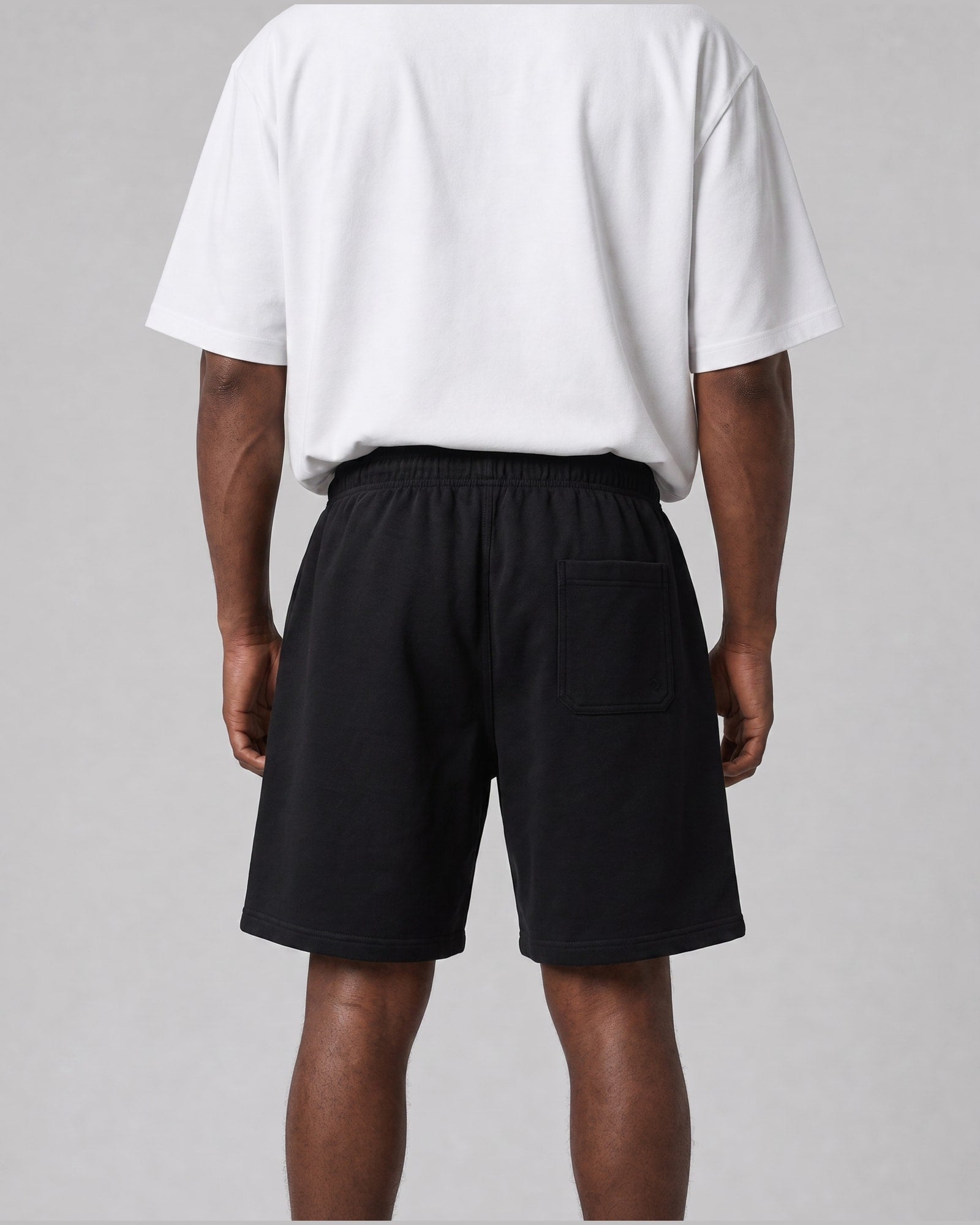 Essential Relaxed Short in Black, back view on model