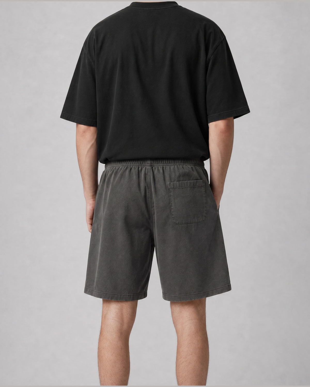 Essential Relaxed Short in Dark Gray, back view on model
