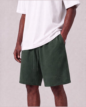 Essential Relaxed Short in Green, front view on model