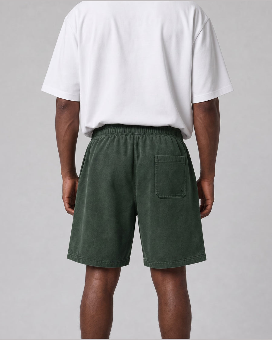 Essential Relaxed Short in Green, back view on model